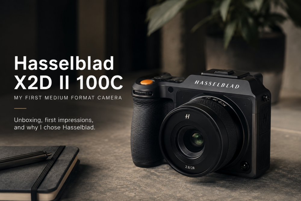 Hasselblad X2D II 100C medium format camera with XCD 28P lens on a table beside a notebook, with text reading “My First Medium Format Camera.”